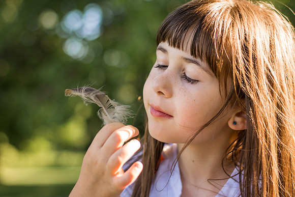 Girl with a feather